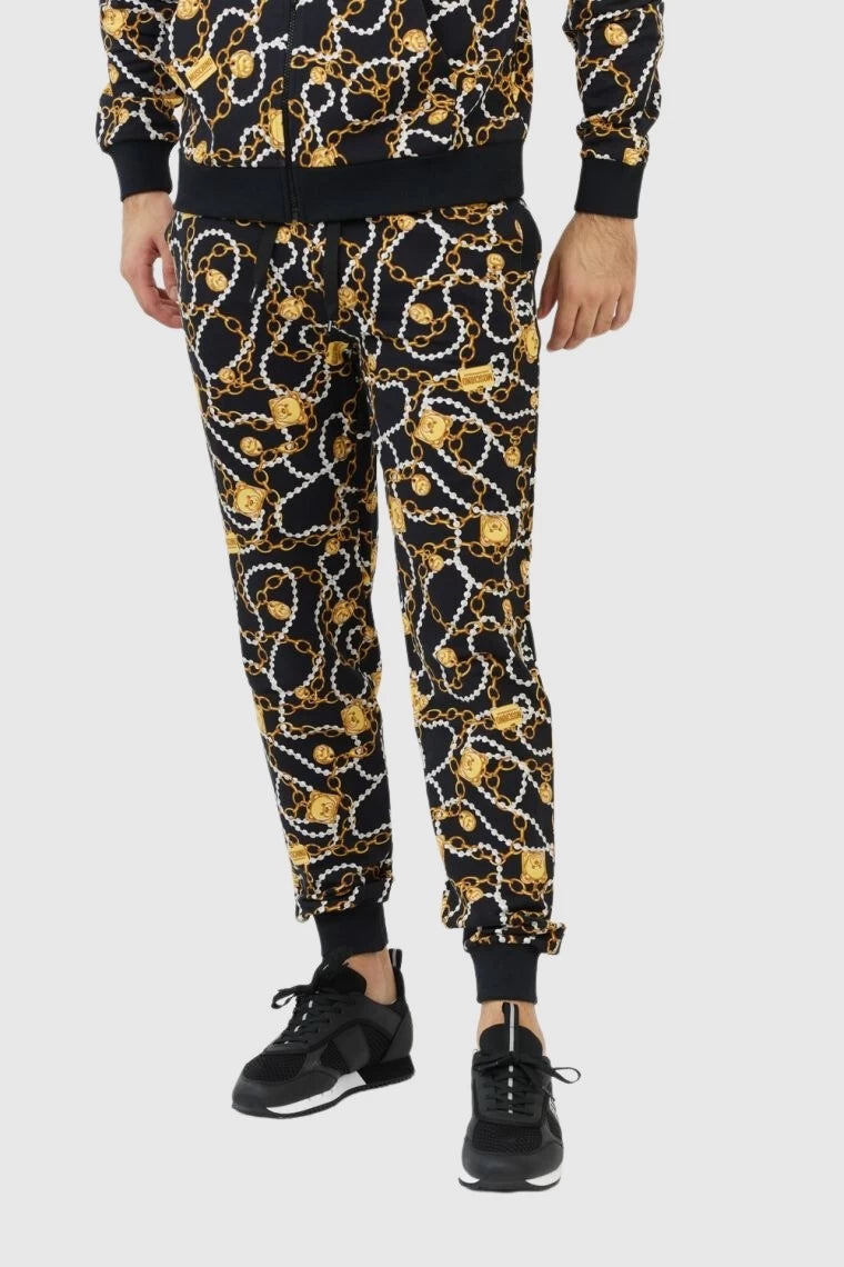 Moschino Black Jogger Pants Featuring Bear Graphic and Chain Details