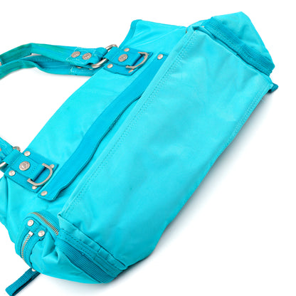 GG&L George Gina & Lucy “MELTYOURMIND” Turquoise Multipocket Shoulder Bag