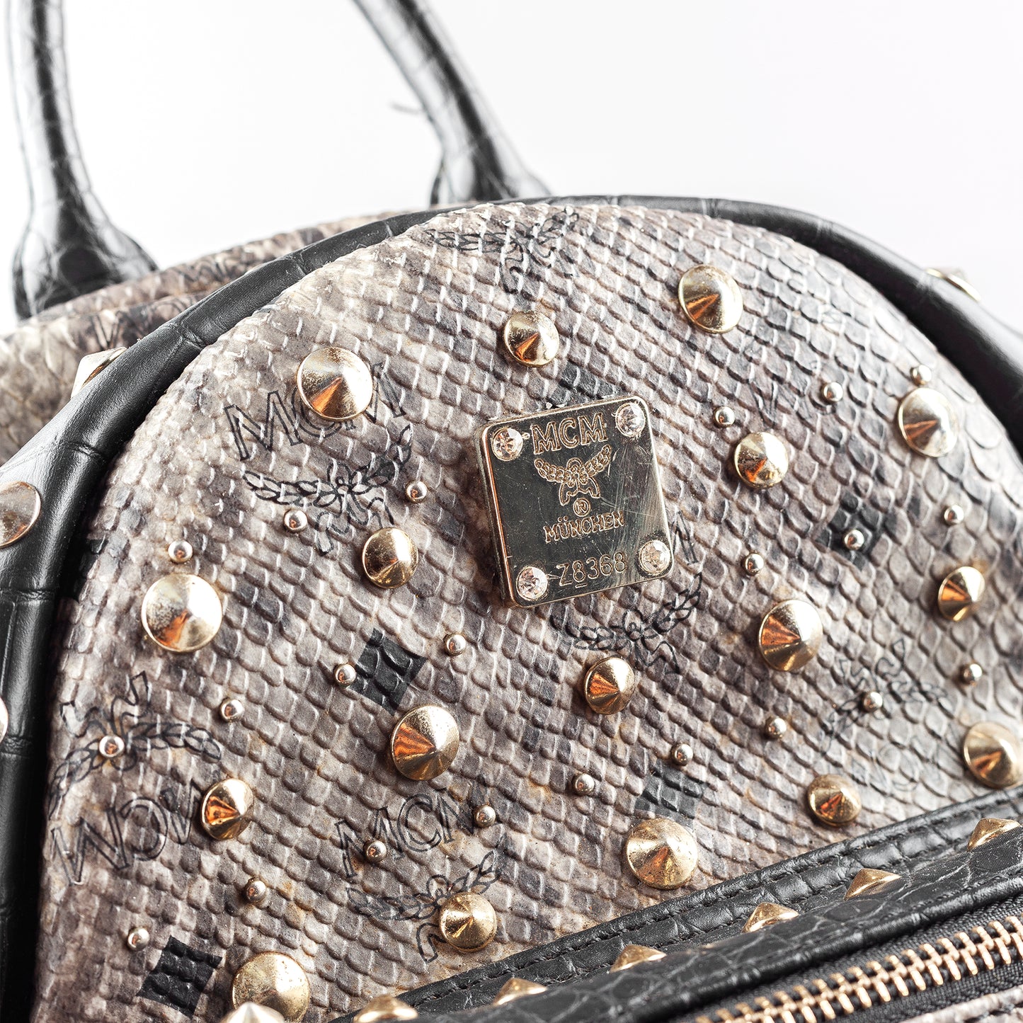 MCM Gray Snakeskin Studded Backpack