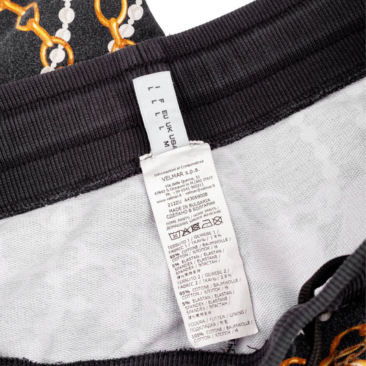 Moschino Black Jogger Pants Featuring Bear Graphic and Chain Details  